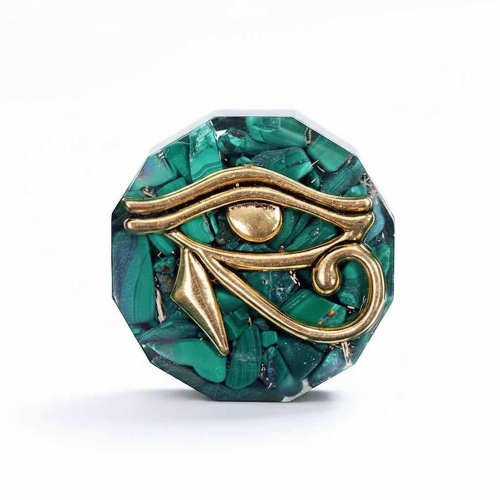 Front view of the Eye of Horus necklace with green crystal